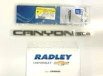 New Oem 04 -12 Gmc Canyon Rear Tail Gate Emblem Nameplate 15926160. Fixed Price $122.99.