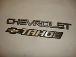 2000 - 2006 Chevrolet Tahoe Gate Emblems Oem. Fixed Price $38.00.