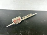1959 Ford F-100 Lightening Bolt & Gear Driver Fender Spear Emblem Part #1006865. Fixed Price $50.00.