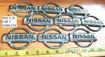 (3) Nissan Quest Circa '96 Emblems F3XA 16B621 (ce 1490). Fixed Price $6.00.
