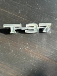 Pontiac Oem 1970 1971 Gto Lemans T-37 Rear Emblem Badge Logo Nameplate 9870518. Fixed Price $20.00.