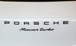 "porsche Macan Turbo" Emblem In Gloss Black 95B04480282041. Fixed Price $895.00.