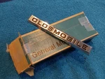 Nos Gm 1967 98 Grille Emblem Front Oldsmobile Nameplate New In Box Oem. Fixed Price $99.99.