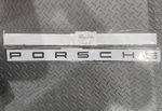 Genuine "p O S H Cayenne Rear Badge Emblem Matte Black 95855968702. Fixed Price $85.00.