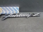 New Genuine Nissan Datsun Fairlady Emblem For S30 240Z 63805-E4100. Fixed Price $211.00.