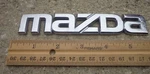 Mazda Trunk Emblem Badge Decal Logo Chrome Rear 3 626 Protege Oem Genuine. Fixed Price $15.98.