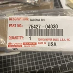 2015-2026 Toyota Tacoma Right Front Door Emblem 75427-04030 Chrome. Fixed Price $30.00.