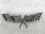 1977 Corvette Gm # 379935 Fuel Gas Door X Flag Emblem - Nos. Fixed Price $90.00.