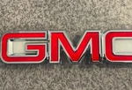 Gmc Sierra 1500 Abs Front Grille Emblem Ami 96500P Red/chrome 1999-2007. Fixed Price $34.99.