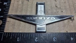 Chevrolet Monza Early '60S Emblem 6284013 (6644. Fixed Price $25.00.