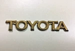 Toyota Gold Script Trunk Emblem Avalon Corolla Camry Oem 7544710. Fixed Price $16.99.
