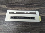 Subaru Oem Emblem - Touring Xt J121SAN000. Fixed Price $12.99.