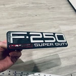 99-04 Ford F250 Lariat Super Duty Emblem F81Z-16720-VA Logo F-250. Fixed Price $17.99.