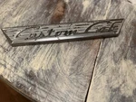 Vintage 1955 1956 Ford Custom Cab Emblem BAAF-8125622-A. Oem. Fixed Price $15.00.