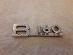 International B160 Left/driver Emblem - Used P/n 219296R1. Fixed Price $50.00.