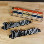 Pair Nos 1973 Datsun Nissan 1800 Series Emblems L+r # 78823-U2000. Fixed Price $110.40.