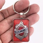 Antique 1897-1919 Oldsmobile Emblem Logo 1" X 1.25" Diameter Keychain. Fixed Price $12.95.