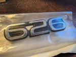 New Mazda 626 Trunk Emblem Badge (GA2K-51-720) 1993 To 1997. Fixed Price $22.95.