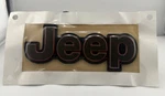 2016-2017 Bronze Jeep Rear Liftgate Emblem Nameplate Oem New Mopar 68329908AA. Fixed Price $68.99.
