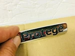 Oem 1995 1996 1997 1998 Mazda Protege Rear Trunk Emblem. Fixed Price $15.29.