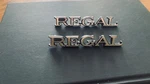 Buick Regal (2) 1980'S Emblem Badge Pn 9658539. Fixed Price $10.00.