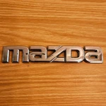 2003-2008 "mazda" Plastic Trunk Emblem P/n 3M81-54465504-AA Used. Fixed Price $7.99.