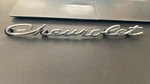 1966 - 1968 Chevrolet Script Emblem PT#4498399. Fixed Price $45.00.