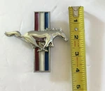 Mustang C5ZZ-16228-D (rh) Scott Drake Fender Emblem. Fixed Price $10.00.