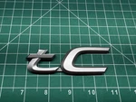 Used Genuine Oem Rear Tc Emblem For 2005-2010 Scion Models Re-taped!!. Fixed Price $12.00.