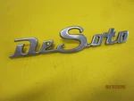 Nos 1946 1947 1948 1949 Desoto Fender Emblem Nameplate Script Mopar 1306467. Fixed Price $95.00.