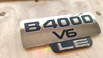 98 - Mazda B4000 V6 Fender Emblem Logo Badge 99 01 02 03 04 05 06 07. Fixed Price $19.99.