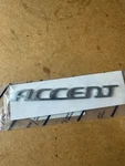 New 2006 To 2011 Hyundai Accent Rear Nameplate Emblem Oem 86311 1E000 / Su 2165. Fixed Price $23.25.