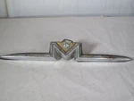 57 Mercury Turnpike Cruiser Rear Trunk Lock Emblem BAE-6443525-A Oem Fomoco. Fixed Price $125.00.