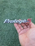2002 2003 Mazda Rear Trunk Emblem Logo Badge Symbol Oem. Fixed Price $15.00.