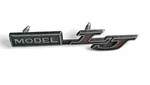 Model Lj Emblem 1976 Grand Prix Oem Console Badge 3" Script. Fixed Price $44.95.