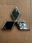 Genuine Oem Rear Emblem Symbol 2022-2025 Mitsubishi Outlander 7415A735. Fixed Price $15.00.