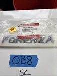 2004-2008 Suzuki Forenza Tailgate Emblem 77851-85Z00 Logo Decal. Fixed Price $16.20.