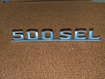Mercedes 500SEL Rear Trunk Bade Emblem 1268170615 W126 Oem Metal Genuine. Fixed Price $39.99.