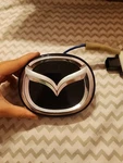 Bcjh 56 8D0 Mazda Trunk Release Button. Fixed Price $80.00.