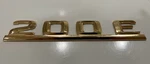 Mercedes-benz Rear Lid Model Badge 124-817-29-15 For Mbz 200E 1986-1993. Fixed Price $43.96.