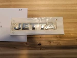 Vw Jetta Rear Emblem 1K9853687A739. Fixed Price $12.00.