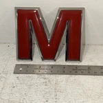 New Oem 15565511B 1983-88 Gmc Sierra Trucks Front Grille Emblem Letter Nos. Fixed Price $54.80.