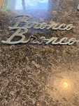 Set Of 2 1966-77 Ford Bronco Script Emblem C7TB-16098-B Oem Looks New!. Fixed Price $79.00.