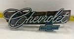 Oem Gm Grille Script Emblem W/pins + Bracket 1970-1971CHEVROLET Impala (674). Fixed Price $49.95.