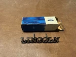 Nos Ford D4VY-6542528-A 1974 Lincoln Towncar Trunk Nameplate With Hardware. Fixed Price $50.00.