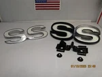 Lot Of Ss Grille/fender Emblems, 1- General Detroit #331773, 333702, Gm. Fixed Price $39.99.