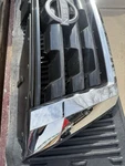 Oem Nissan Armada Grille 62310-6JL0B Camera Has Some Scratches 21-24. Fixed Price $500.00.