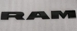 Genuine Mopar Ram Front Door Nameplate 68309785AA. Fixed Price $75.00.