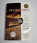 Prairie Fires: The American Dreams Of Laura Ingalls Wilder (042125). Fixed Price $14.99.
