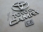 97-01 Toyota Camry Ce Ornament 75311-AA020 Logo 75442-33050 Emblem Decals Set. Fixed Price $22.95.